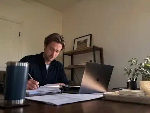 Illustrative image of Trenton Nield reviewing estate planning documents in a simple office